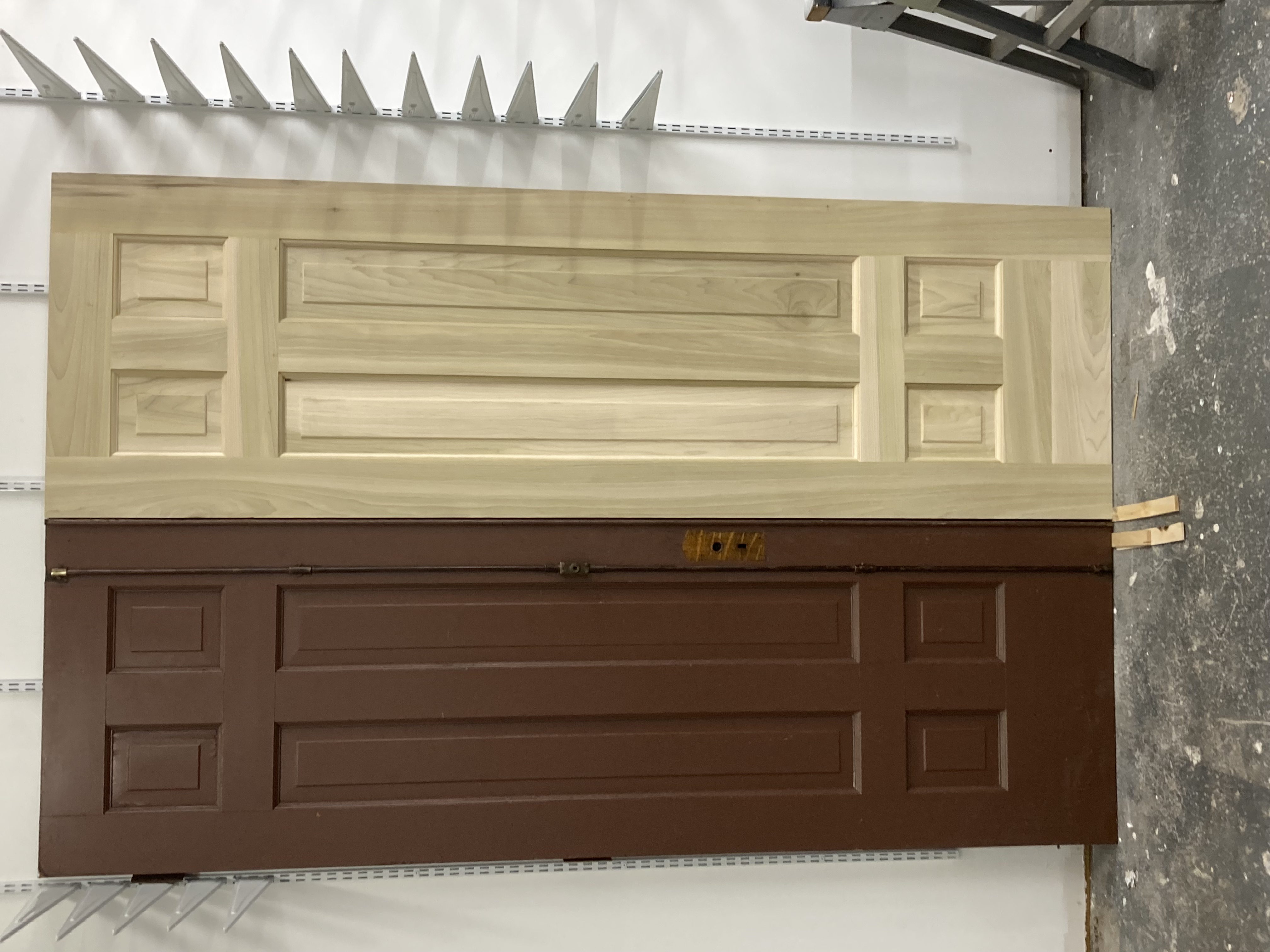 Solid wood custom door panels during finishing process