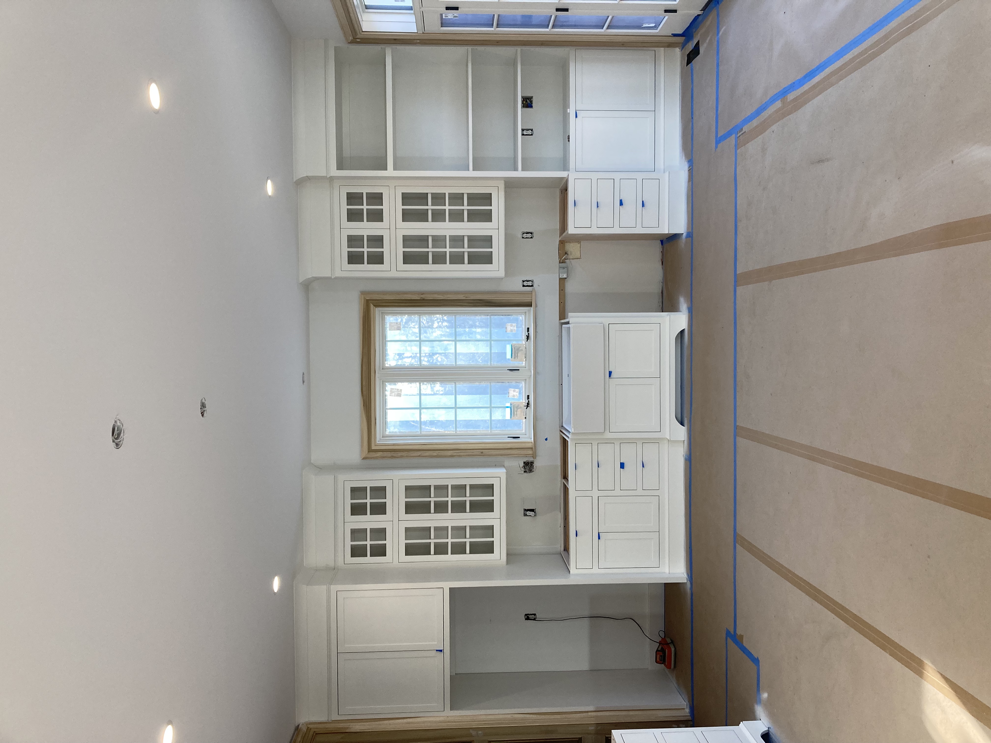 Custom kitchen cabinetry and trim installation